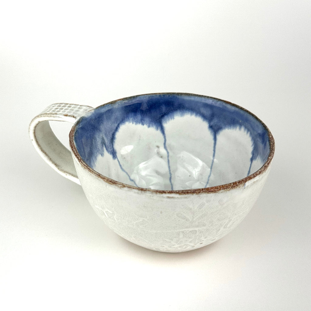 Cappuccino Cup White Flower On Blue