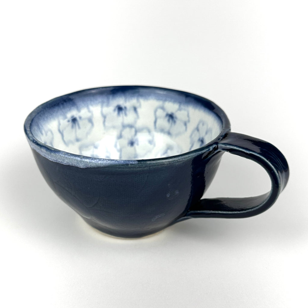 Cappuccino Cup With Scattered Flowers